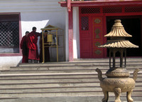 Monks debating the virtues of the prayer wheels