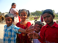 Kids with henna decordated hands, Hampi