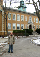 Alek in his new tulupchik in front of JFK's school in Brookline