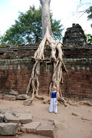 114. Ta Prohm - the unrestored temple left surround by a jungle