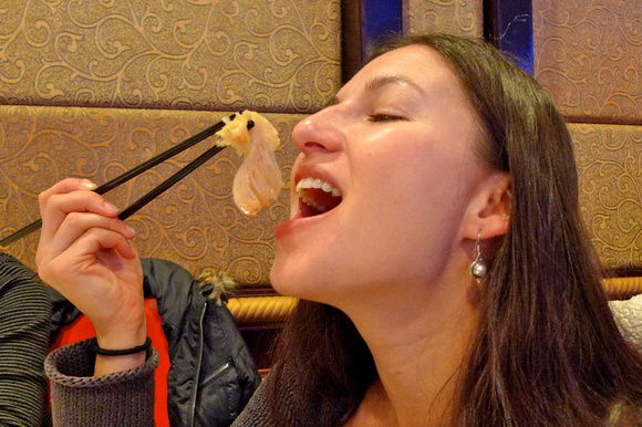 Devouring steamed beef stomach