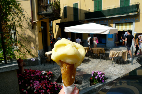 Plum gelato in the early afternoon sun. Gelateria del Borgo, Bellagio.