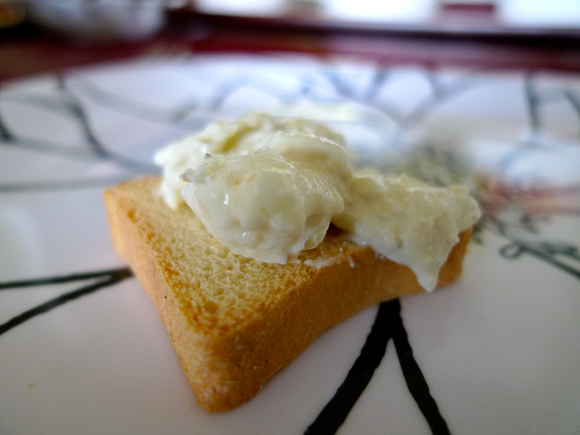 White artichoke dip on toast